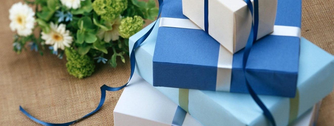 stacked blue colored gift boxes