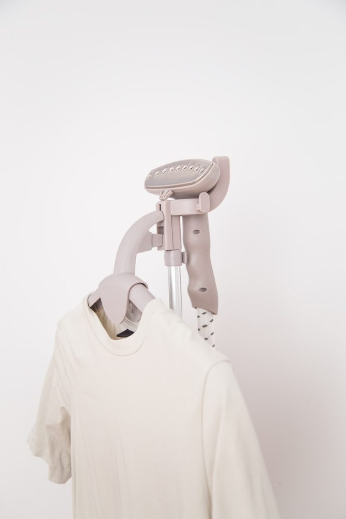 white crew-neck shirt on hanger