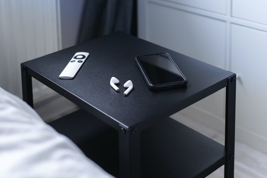 gadgets on top of a side table